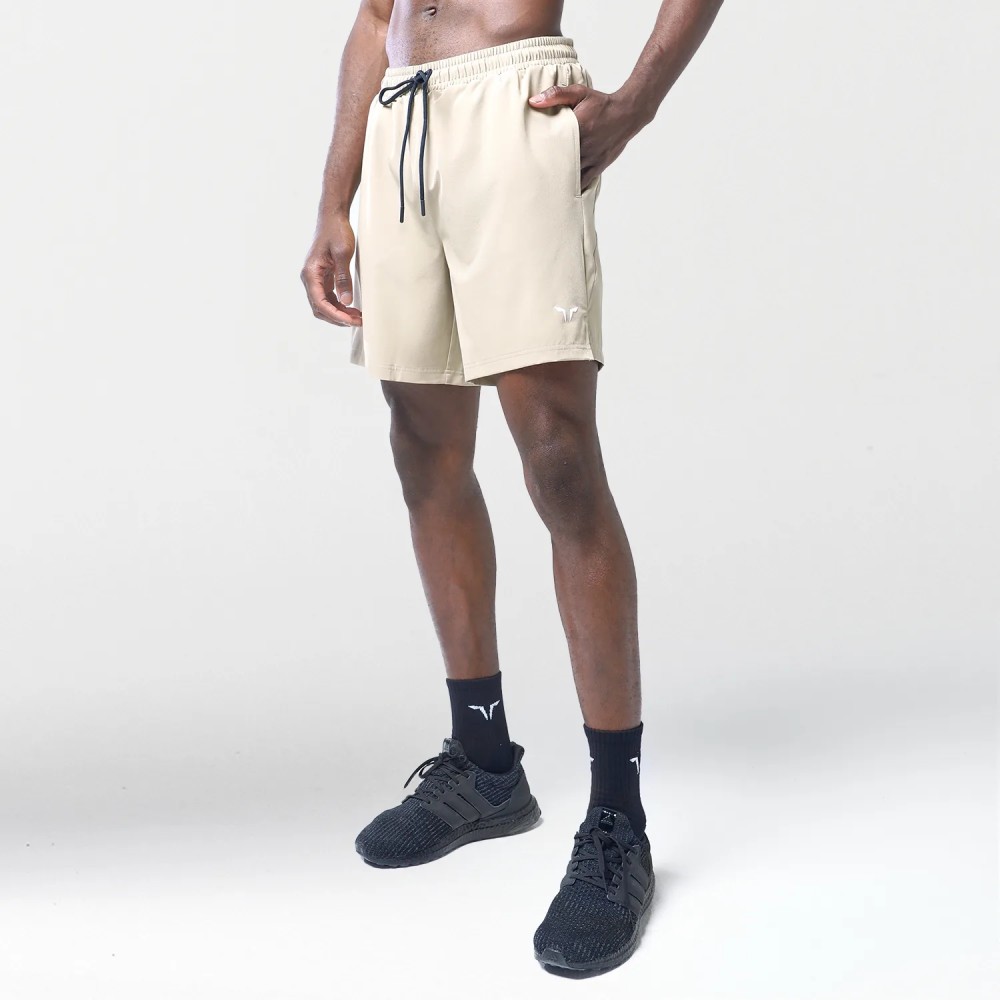 ESSENTIAL 7 INCH SHORTS – SAND